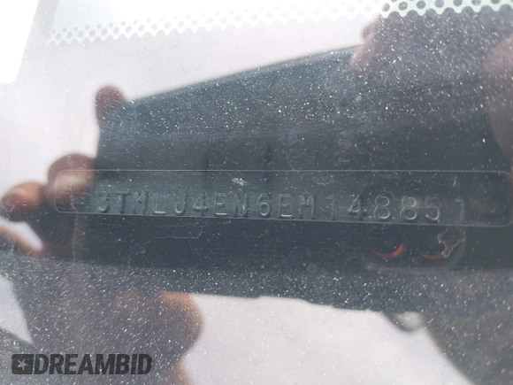 2014 Toyota Tacoma with VIN 3TMLU4EN6EM148851, listed as a IAAI auction lot 42307954 with 71,784 mi miles and . Bid and sale history available at DreamBid. Image 18.