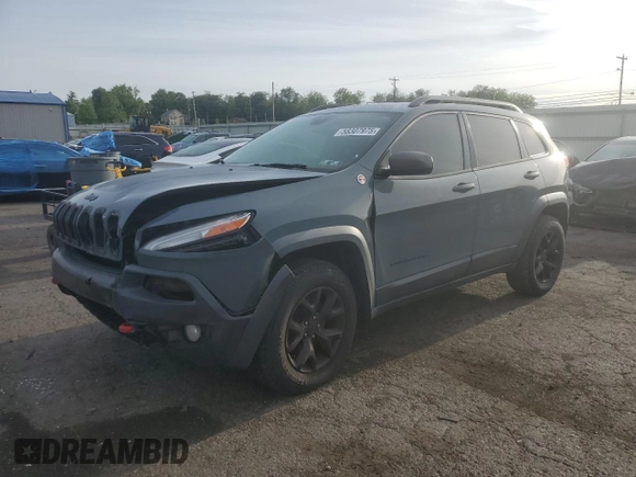 2014 Jeep Cherokee Trailhawk with VIN 1C4PJMBS3EW308706, listed as a Copart auction lot 58307975 with 90,530 mi miles and Salvage title. Bid and sale history available at DreamBid. Image 1.