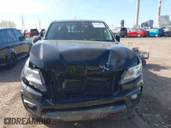 2021 Chevrolet Colorado 4WD Z71 with VIN 1GCGTDEN5M1167486, listed as a IAAI auction lot 42124990 with 162,297 mi miles and . Bid and sale history available at DreamBid. Image 12.