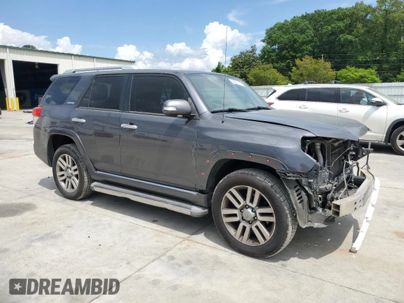 2011 Toyota 4Runner Trail with VIN JTEBU5JRXB5034150, listed as a Copart auction lot 55321715 with 171,022 mi miles and Salvage title. Bid and sale history available at DreamBid. Image 4.