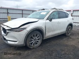 2019 Mazda CX-5 Grand Touring with VIN JM3KFBDM9K0697467, listed as a IAAI auction lot 41940364 with 62,015 mi miles. Bid and sale history available at carsss.com. Image 18.