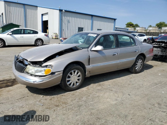 2002 Lincoln Continental with VIN 1LNHM97V22Y699435, listed as a Copart auction lot 66672354 with 216,764 mi miles and Salvage Title. Bid and sale history available at carsss.com. Image 1.