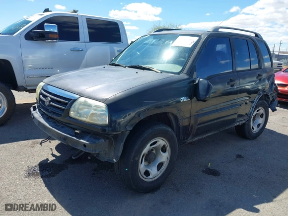 2001 Suzuki Grand Vitara JLX with VIN JS3TD62V414156342, listed as a IAAI auction lot 41762508 with 214,235 mi miles. Bid and sale history available at carsss.com. Image 18.