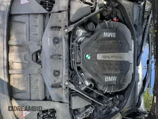 2014 BMW 6 Series z VIN WBAYP9C52ED16921, wystawiony jako Copart lot #55470855 z przebiegiem 101 777 mil mil oraz Czysty tytuł • Clean title. Historia ofert i sprzedaży dostępna na DreamBid. Obrazek 7.