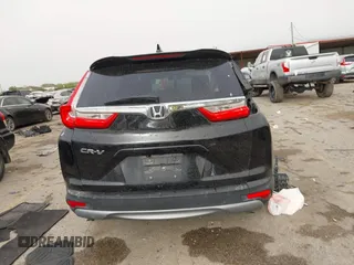 2019 Honda CR-V EX with VIN 5J6RW1H54KA039693, listed as a IAAI auction lot 41827425 with 100,371 mi miles. Bid and sale history available at carsss.com. Image 16.