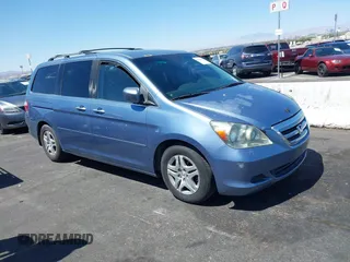 2006 Honda Odyssey EX z VIN 5FNRL38466B065601, wystawiony jako IAAI lot #42559342 z przebiegiem 258 995 mil mil oraz . Historia ofert i sprzedaży dostępna na DreamBid. Obrazek 1.