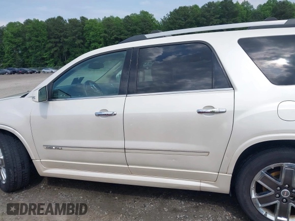 2012 GMC Acadia Denali with VIN 1GKKVTED5CJ197001, listed as a IAAI auction lot 42303383 with 211,958 mi miles and . Bid and sale history available at DreamBid. Image 14.