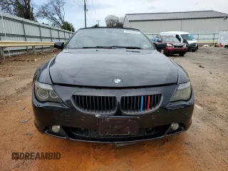 2007 BMW 6 Series 650i z VIN WBAEK13517CN72486, wystawiony jako Copart lot #47952395 z przebiegiem Nie podano mil oraz Szkoda całkowita • Salvage title. Historia ofert i sprzedaży dostępna na DreamBid. Obrazek 5.