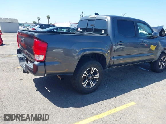 2017 Toyota Tacoma SR5 with VIN 3TMCZ5AN0HM098367, listed as a IAAI auction lot 42299298 with 69,770 mi miles and . Bid and sale history available at DreamBid. Image 4.