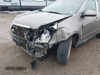 2012 Cadillac SRX Luxury Collection with VIN 3GYFNAE33CS587208, listed as a IAAI auction lot 42142976 with 218,380 mi miles and . Bid and sale history available at carsss.com. Image 6.