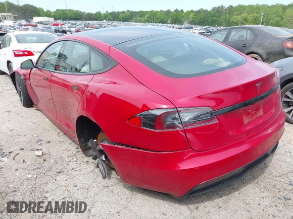 2022 Tesla Model S with VIN 5YJSA1E58NF470737, listed as a IAAI auction lot 42035040 with 15,224 mi miles and . Bid and sale history available at DreamBid. Image 3.