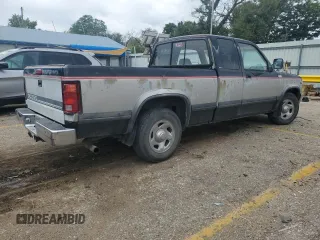 1995 Dodge Dakota z VIN 1B7GL23X2SS386485, wystawiony jako Copart lot #72893124 z przebiegiem 202 537 mil mil oraz Szkoda całkowita • Salvage title. Historia ofert i sprzedaży dostępna na DreamBid. Obrazek 3.