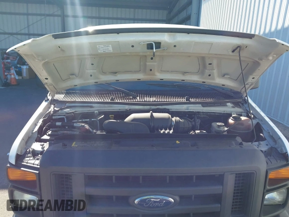 2013 Ford Econoline Cargo Commercial with VIN 1FTNE2EL2DDA97948, listed as a IAAI auction lot 41616701 with 199,739 mi miles and . Bid and sale history available at DreamBid. Image 10.