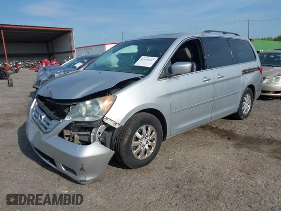 2010 Honda Odyssey EX-L with VIN 5FNRL3H78AB034756, listed as a IAAI auction lot 41979532 with 167,791 mi miles and . Bid and sale history available at DreamBid. Image 2.