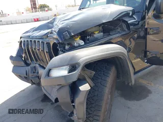 2020 Jeep Wrangler Unlimited Freedom with VIN 1C4HJXDG0LW238819, listed as a IAAI auction lot 42139357 with 67,619 mi miles and . Bid and sale history available at DreamBid. Image 6.