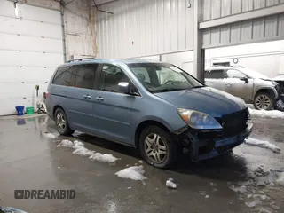 2006 Honda Odyssey EX-L z VIN 5FNRL38736B061208, wystawiony jako IAAI lot #41108489 z przebiegiem 340 013 mil mil oraz . Historia ofert i sprzedaży dostępna na DreamBid. Obrazek 1.