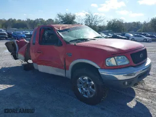 2000 Ford F-150 XL with VIN 1FTRX18L1YNC06272, listed as a IAAI auction lot 41780486 with 295,611 mi miles. Bid and sale history available at carsss.com. Image 1.