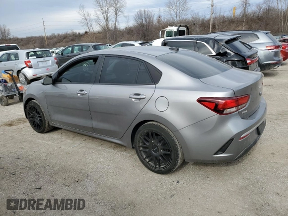 2023 Kia Rio S with VIN 3KPA24AD3PE517933, listed as a Copart auction lot 41072394 with 26,058 mi miles and Salvage Title. Bid and sale history available at DreamBid. Image 2.