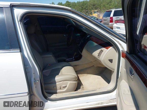 2006 Cadillac DTS w/1SC with VIN 1G6KD57Y36U116528, listed as a IAAI auction lot 42063595 with 128,839 mi miles. Bid and sale history available at carsss.com. Image 5.