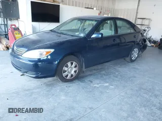 2004 Toyota Camry LE with VIN 4T1BE32K44U361333, listed as a IAAI auction lot 41327222 with 76,314 mi miles and . Bid and sale history available at carsss.com. Image 2.
