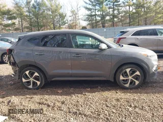 2016 Hyundai Tucson Sport with VIN KM8J33A21GU232747, listed as a IAAI auction lot 41443169 with 111,319 mi miles. Bid and sale history available at carsss.com. Image 13.