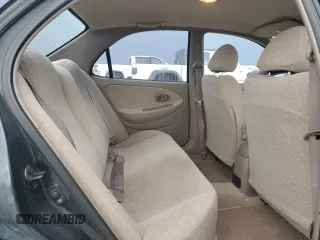 2000 Hyundai Elantra GLS z VIN KMHJF35F3YU002102, wystawiony jako Copart lot #73243004 z przebiegiem 79 155 mil mil oraz Szkoda całkowita • Salvage title. Historia ofert i sprzedaży dostępna na DreamBid. Obrazek 11.