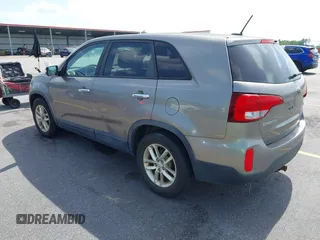 2014 Kia Sorento LX with VIN 5XYKT3A60EG486699, listed as a IAAI auction lot 42143270 with 127,190 mi miles and . Bid and sale history available at DreamBid. Image 3.