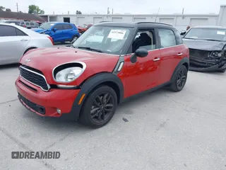 2013 MINI Countryman S z VIN WMWZC3C51DWP22150, wystawiony jako IAAI lot #41973886 z przebiegiem 28 947 mil mil oraz . Historia ofert i sprzedaży dostępna na DreamBid. Obrazek 2.
