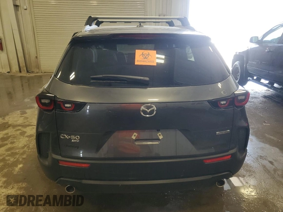 2025 Mazda CX-50 S Premium с VIN 7MMVABDM7SN310681, выставлен на аукционе Copart как лот 54887345 с пробегом 232 миль миль и Списание • Salvage title. История ставок и продаж доступна на DreamBid. Изображение 6.
