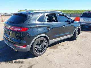 2015 Lincoln MKC with VIN 5LMTJ2AH6FUJ13505, listed as a IAAI auction lot 41871254 with 107,924 mi miles. Bid and sale history available at carsss.com. Image 4.