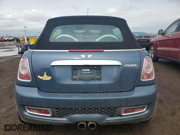 2011 MINI Convertible S z VIN WMWZP3C52BTX84305, wystawiony jako Copart lot #59586995 z przebiegiem 36 217 mil mil oraz Szkoda całkowita • Salvage title. Historia ofert i sprzedaży dostępna na DreamBid. Obrazek 6.