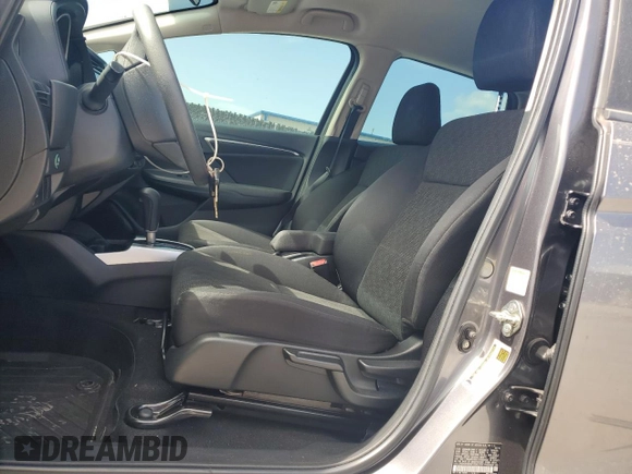 2015 Honda Fit LX with VIN 3HGGK5H56FM717242, listed as a Copart auction lot 62993835 with 155,310 mi miles and Clean title. Bid and sale history available at DreamBid. Image 7.