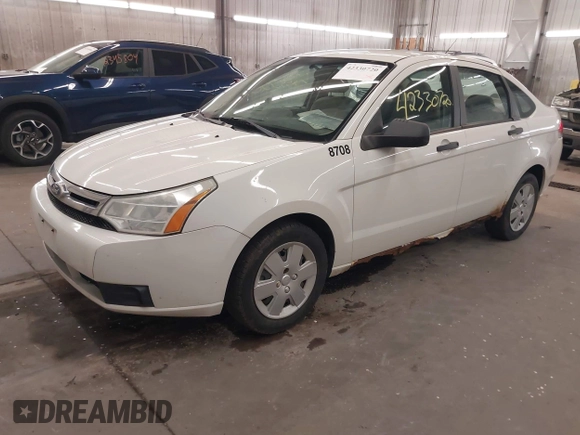 2010 Ford Focus S z VIN 1FAHP3EN6AW298708, wystawiony jako IAAI lot #42330720 z przebiegiem 210 067 mil mil oraz . Historia ofert i sprzedaży dostępna na DreamBid. Obrazek 2.