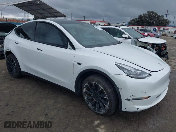 2023 Tesla Model Y Long Range with VIN 7SAYGDEE1PA106057, listed as a IAAI auction lot 41778642 with 1 mi miles. Bid and sale history available at carsss.com. Image 1.