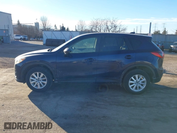 2014 Mazda CX-5 Touring with VIN JM3KE2CY8E0375009, listed as a IAAI auction lot 41420045 with 138,404 mi miles. Bid and sale history available at carsss.com. Image 14.