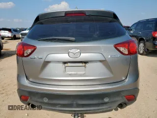 2013 Mazda CX-5 Sport with VIN JM3KE2BE5D0129797, listed as a Copart auction lot 58051185 with 200,712 mi miles and Salvage title. Bid and sale history available at DreamBid. Image 6.