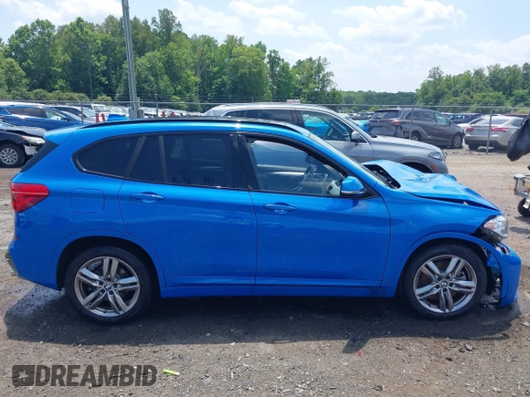 2021 BMW X1 xDrive28i with VIN WBXJG9C04M5T61811, listed as a IAAI auction lot 42509852 with 30,400 mi miles and . Bid and sale history available at DreamBid. Image 13.