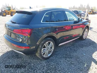2018 Audi Q5 Premium Plus with VIN WA1BNAFY9J2125799, listed as a IAAI auction lot 42035992 with 59,403 mi miles. Bid and sale history available at carsss.com. Image 4.