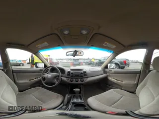 2002 Toyota Camry LE z VIN 4T1BE32K52U081479, wystawiony jako IAAI lot #41344104 z przebiegiem 243 950 mil mil oraz . Historia ofert i sprzedaży dostępna na DreamBid. Obrazek 18.
