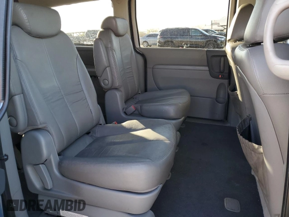 2009 Kia Sedona EX with VIN KNDMB233196275030, listed as a Copart auction lot 71997154 with 96,777 mi miles and Salvage Title. Bid and sale history available at carsss.com. Image 12.