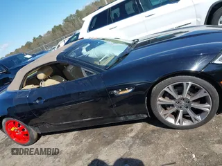 2014 Jaguar XK with VIN SAJWA4GB0ELB52358, listed as a IAAI auction lot 41832850 with 93,037 mi miles. Bid and sale history available at carsss.com. Image 14.