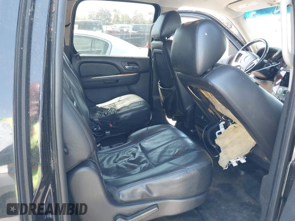 2011 Chevrolet Suburban LT with VIN 1GNSCJE0XBR285973, listed as a IAAI auction lot 42007844 with 252,994 mi miles. Bid and sale history available at carsss.com. Image 8.
