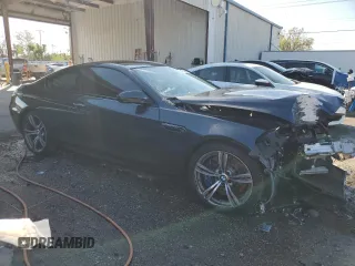 2015 BMW M6 z VIN WBSLX9C59FD160716, wystawiony jako Copart lot #47144925 z przebiegiem 55 535 mil mil oraz Szkody całkowita. Historia ofert i sprzedaży dostępna na DreamBid. Obrazek 4.