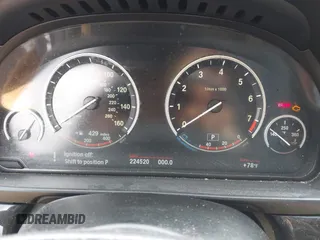 2013 BMW 5 Series 528i xDrive with VIN WBAXH5C50DD107198, listed as a IAAI auction lot 42679395 with 224,520 mi miles and . Bid and sale history available at DreamBid. Image 7.
