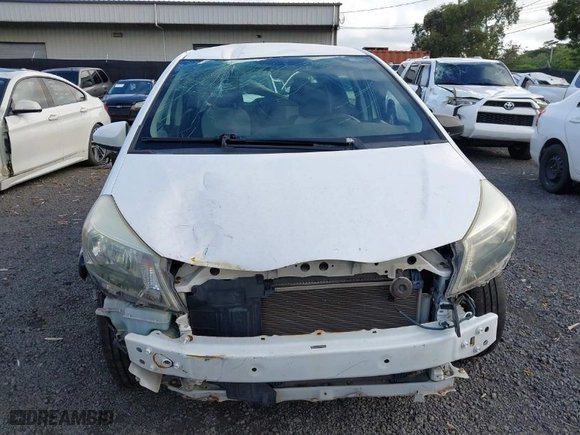 2014 Toyota Yaris L with VIN JTDKTUD39ED586791, listed as a IAAI auction lot 40958187 with 105,143 mi miles. Bid and sale history available at carsss.com. Image 12.