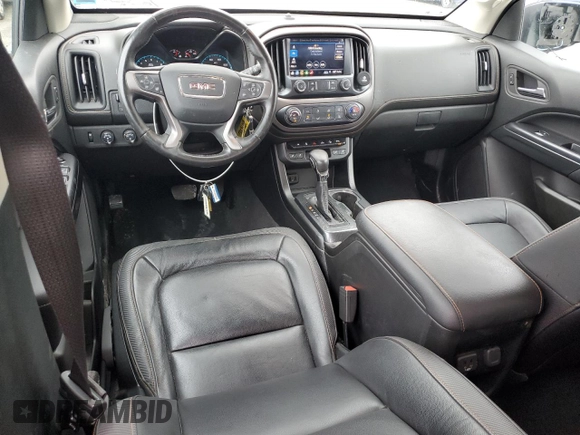 2022 GMC Canyon 4WD AT4 w/Leather with VIN 1GTG6FEN5N1279158, listed as a Copart auction lot 50958545 with 34,569 mi miles and Salvage Title. Bid and sale history available at carsss.com. Image 8.
