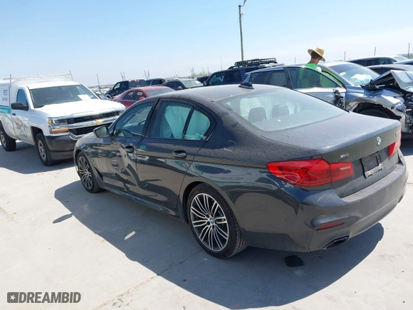 2019 BMW 5 Series 530i xDrive with VIN WBAJA7C50KG910479, listed as a IAAI auction lot 41802413 with 84,932 mi miles. Bid and sale history available at carsss.com. Image 3.