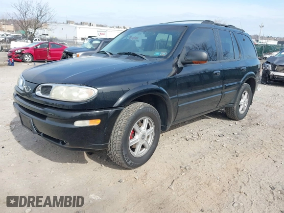2002 Oldsmobile Bravada z VIN 1GHDT13S222469507, wystawiony jako IAAI lot #41787362 z przebiegiem Nie podano mil oraz . Historia ofert i sprzedaży dostępna na DreamBid. Obrazek 16.