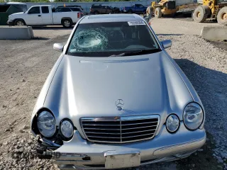 2002 Mercedes-Benz E-Class with VIN WDBJF82J42X077731, listed as a Copart auction lot 70280584 with 169,018 mi miles and Salvage Title. Bid and sale history available at carsss.com. Image 5.