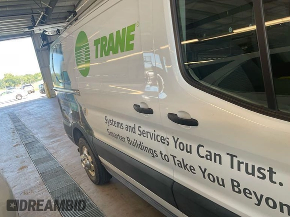 2020 Ford Transit Cargo with VIN 1FTBR2YG9LKA32434, listed as a IAAI auction lot 42718925 with 66,381 mi miles and . Bid and sale history available at DreamBid. Image 10.
